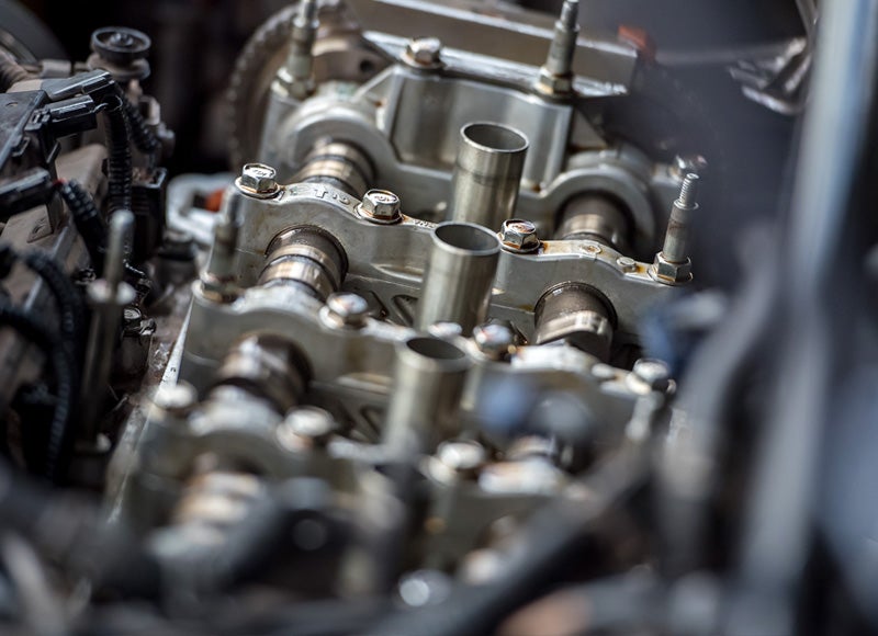 Service tech working on engine